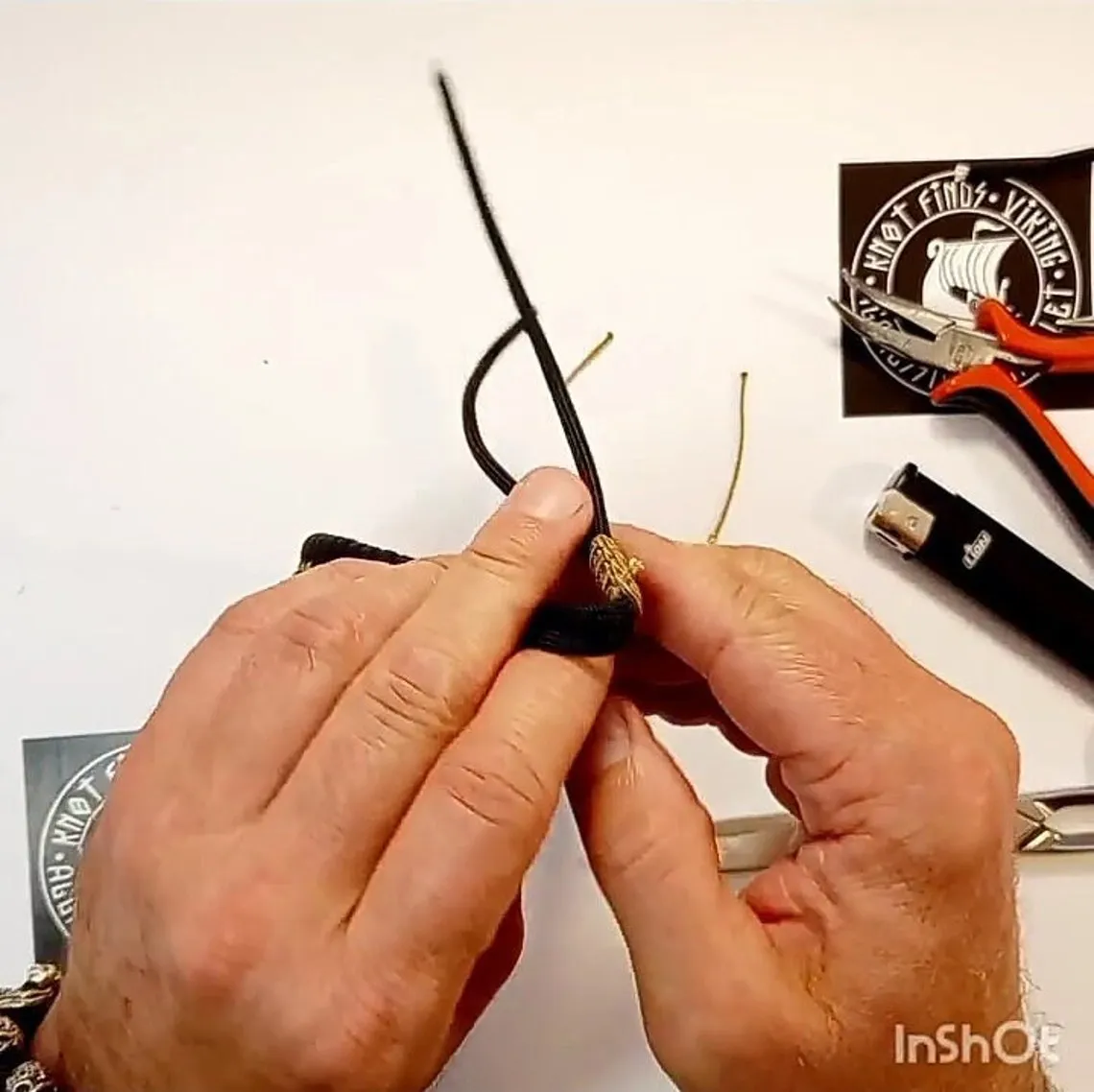 Instruction weaving for the weaving paracord bracelet Mad Max style. Viking jewelry. Valknut symbol.