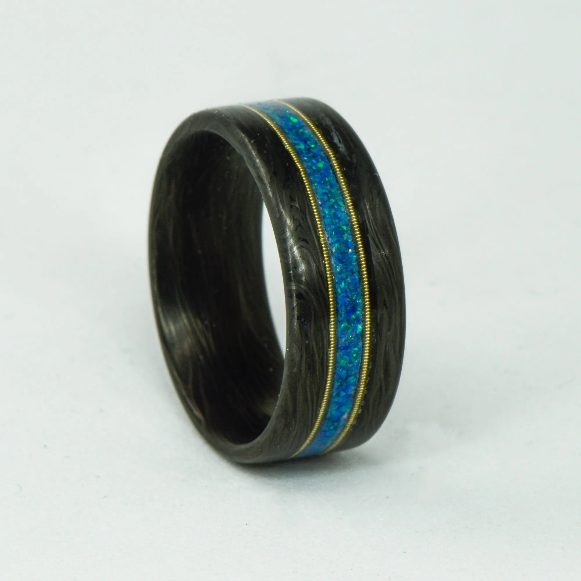 SALE RING - Forged Carbon Fiber, Blue Opal, & Guitar Strings - Size 7.75
