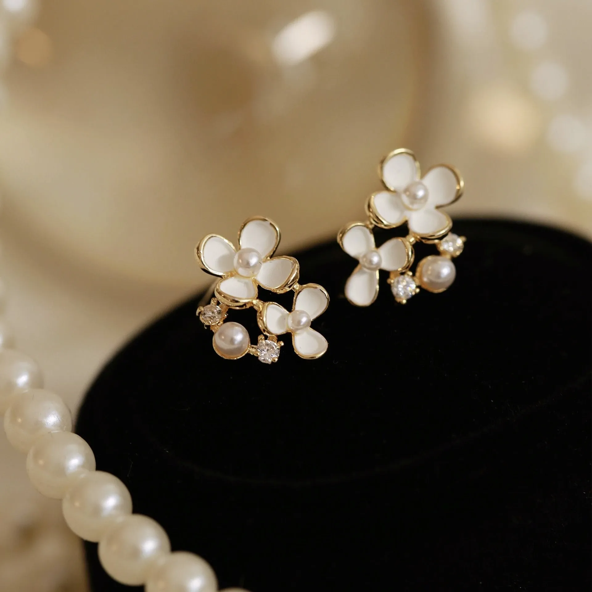 White Flower Clip on Earrings